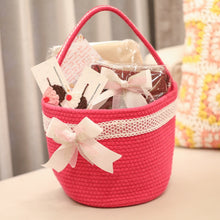 Load image into Gallery viewer, Pink woven basket with a bow 

