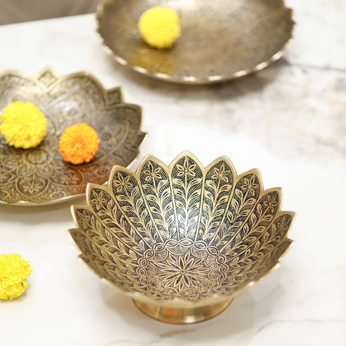 Decorative brass bowls with intricate patterns
